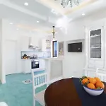 Апартаменты Super Attico Vista Mare Con Piscina