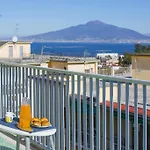 Апартаменты Super Attico Vista Mare Con Piscina